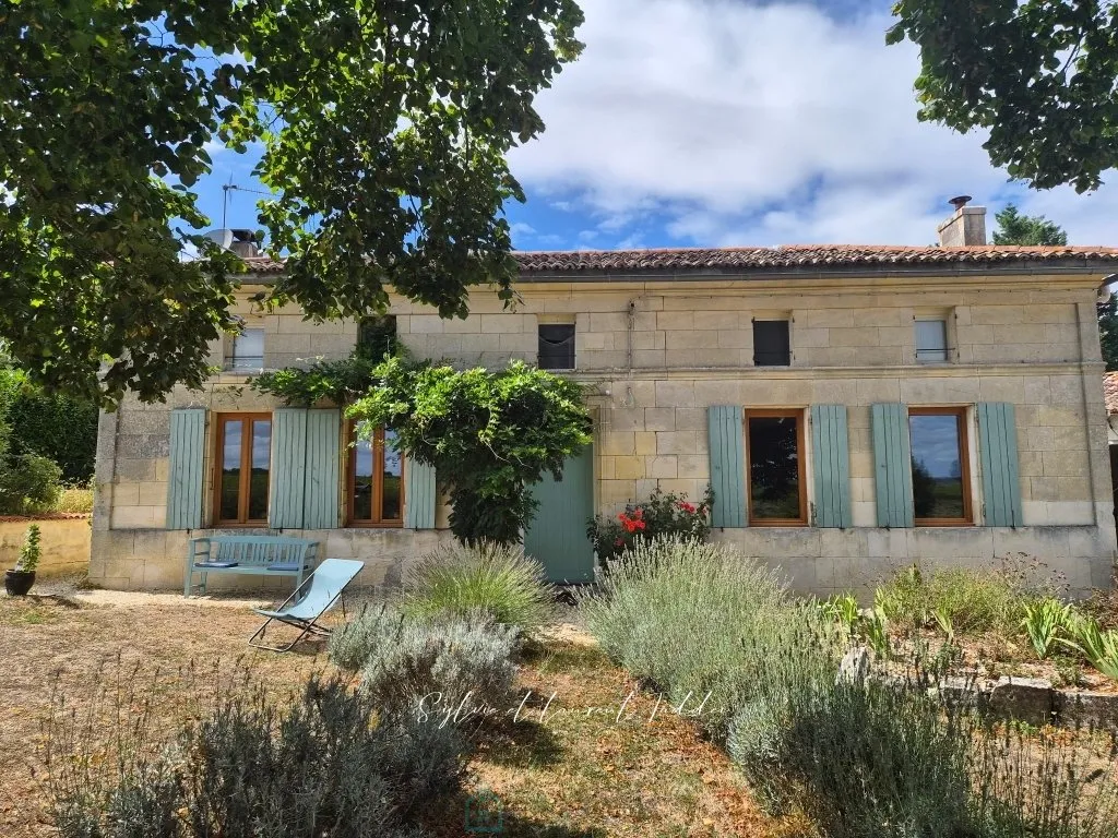 Photo of CHARMING STONE-BUILT CHARENTAISE HOUSE WITH SWIMMING POOL, 4 BEDROOMS, AND OUTBUILDINGS