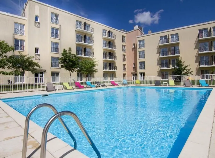 Foto di INVESTIMENTO IN AFFITTO – MONTEVRAIN – Residence du Parc Residenza Affari - Rendimento del 6,35%