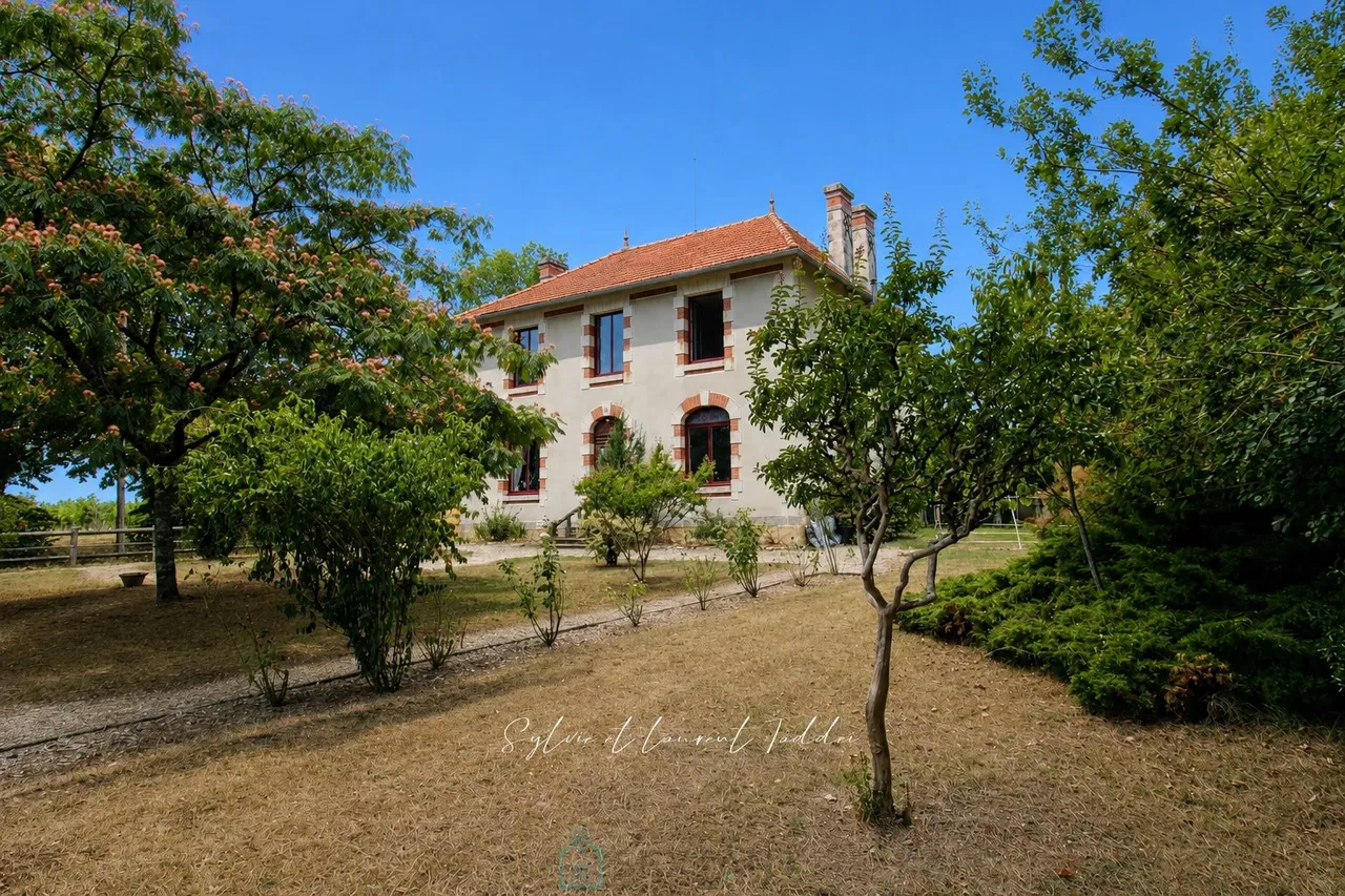 Photo of Renovated stone bourgeois house with swimming pool, outbuildings, and over 3.6 hectares of land.