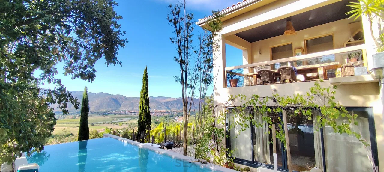 Photo of Architect-designed villa with infinity pool & 360° views